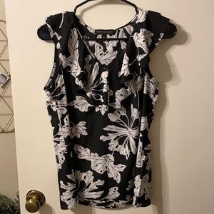 Banana, size S. Super cute top for under a suit or w/ jeans alone.